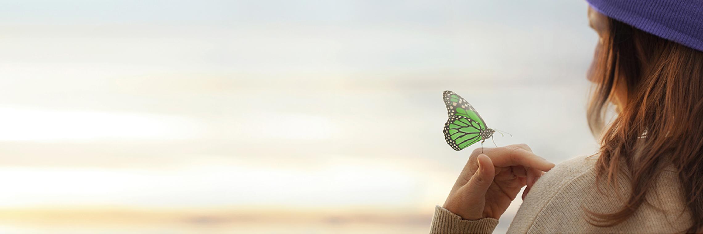 Psoriasis Initiative Ich Titelbild:  Frau mit Schmetterling